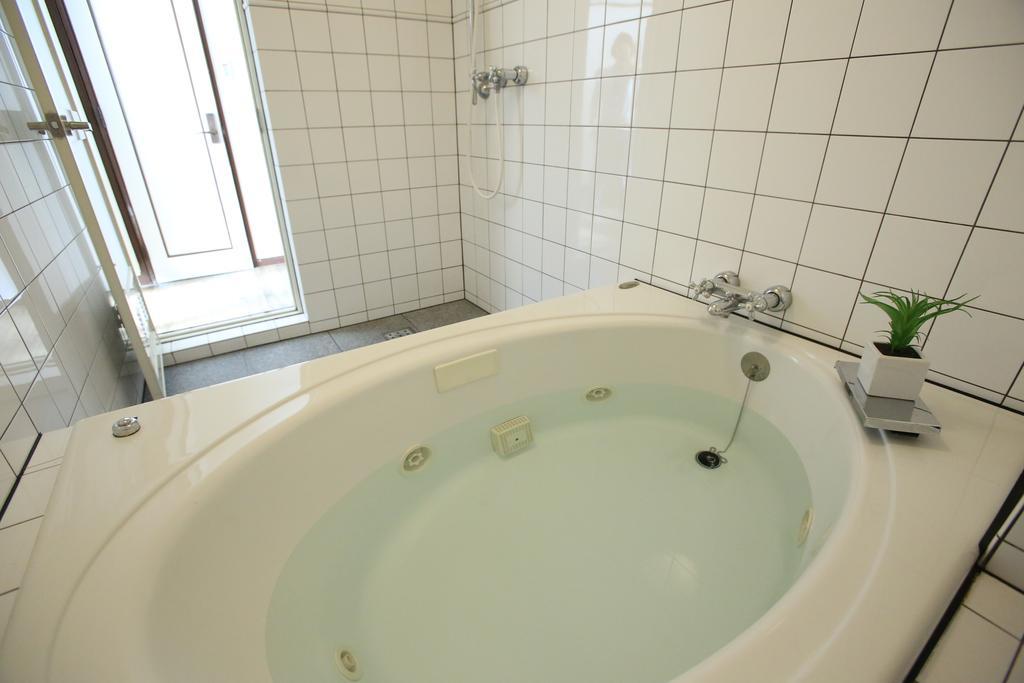 Hotel Tomato Куре Екстериор снимка