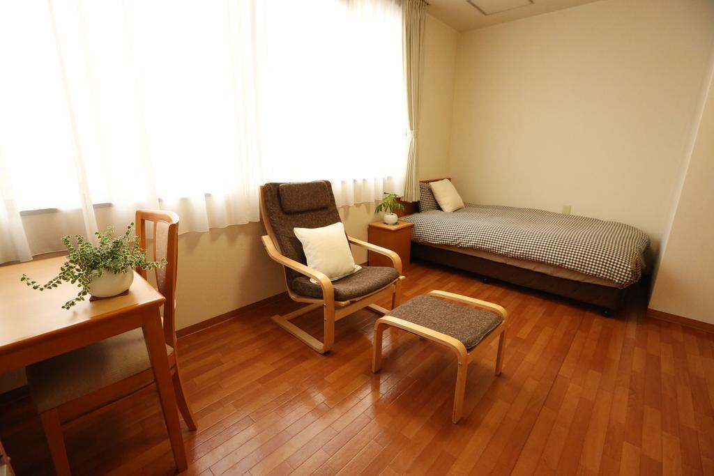 Hotel Tomato Куре Екстериор снимка
